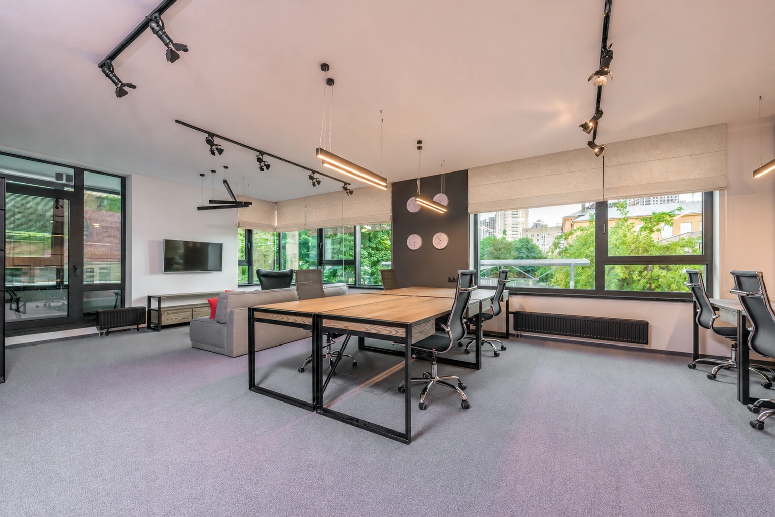Office interior with light oatmeal fabric window shades